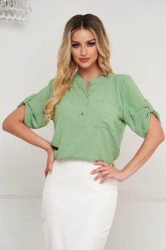 Lightgreen women`s blouse loose fit from veil fabric wrinkled texture
