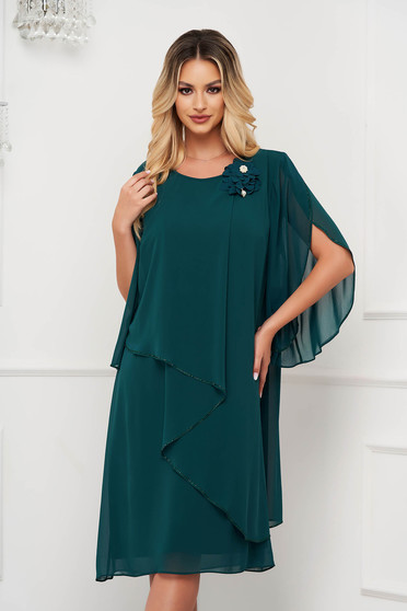 Green dress from veil fabric midi loose fit accessorized with breastpin