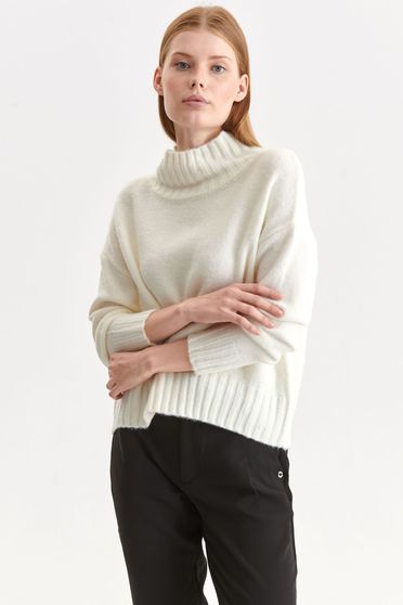 Ivory sweater knitted from fluffy fabric loose fit high collar
