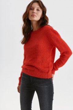 Red sweater knitted from fluffy fabric loose fit with rounded cleavage