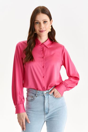Pink women`s shirt loose fit from satin fabric texture