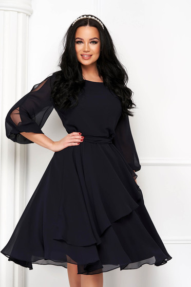 Black dress from veil fabric cloche with puffed sleeves with cut-out sleeves