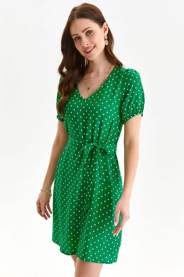 Green dress thin fabric short cut loose fit accessorized with tied waistband with puffed sleeves