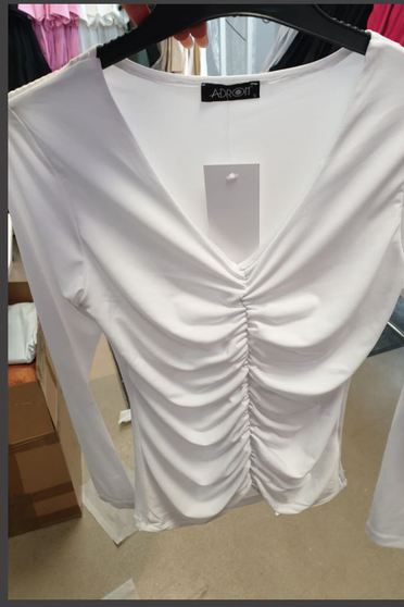 Blouses, White women`s blouse lycra tented with v-neckline - StarShinerS.com