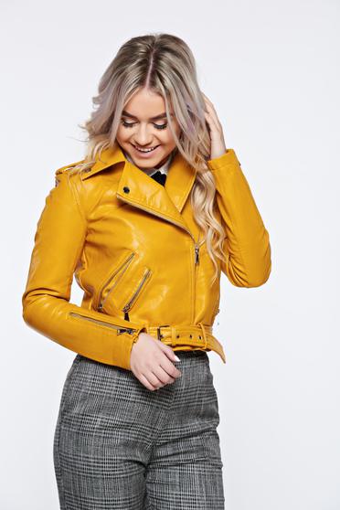 Casual ecological leather mustard yellow jacket accessorized with tied waistband