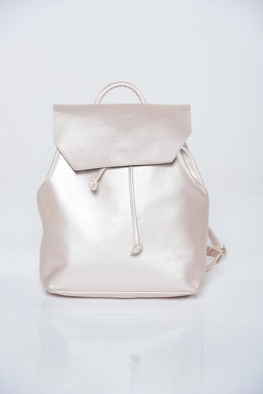 Top Secret nude backpacks with ribbon fastening and a compartment with internal pockets