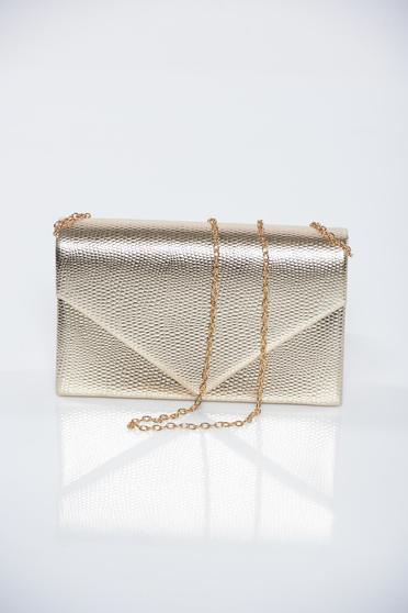 Occasional gold bag from ecological leather accessorized with chain