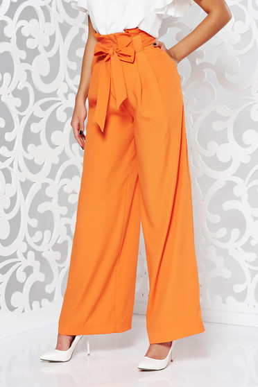 Orange elegant high waisted flared trousers slightly elastic fabric accessorized with tied waistband