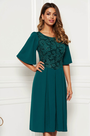 Rochie verde-inchis de ocazie in clos din stofa usor elastica captusita pe interior cu aplicatii cu paiete