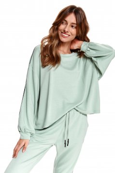 Turquoise women`s blouse with puffed sleeves loose fit from elastic fabric