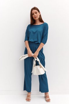 Flared airy fabric accessorized with tied waistband turquoise jumpsuit