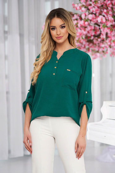 Green women`s blouse loose fit wrinkled material a front pocket