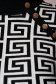 Rochie SunShine neagra scurta cu un croi mulat din material tricotat subtire si elastic accesorizata cu nasturi 4 - StarShinerS.ro