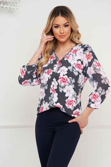 Women`s blouse with ruffle details with padded shoulders with veil sleeves