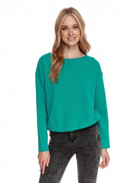 Green women`s blouse loose fit from striped fabric